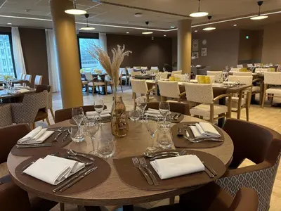 Restaurant ou autre lieu de restauration dans l'établissement DOMITYS - L'échiquier