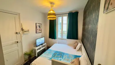 Un ou plusieurs lits dans un hébergement de l'établissement Studio cosy - Quartier Prébendes, Tours centre