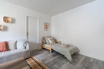 Coin salon dans l'établissement Maison Camélia Grand T2 - 1 chambre