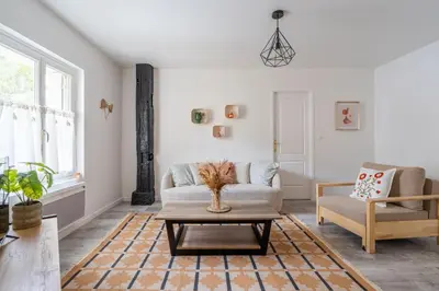 Coin salon dans l'établissement Maison Camélia Grand T2 - 1 chambre