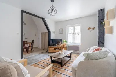 Coin salon dans l'établissement Maison Camélia Grand T2 - 1 chambre