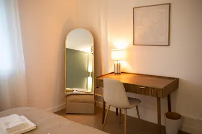 Un ou plusieurs lits dans un hébergement de l'établissement Appartement cosy avec vue dégagée, Centre du Mans