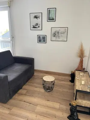 Coin salon dans l'établissement Bright apartment