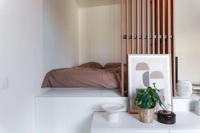 Un ou plusieurs lits dans un hébergement de l'établissement Douceur de Loire Studio Cosy