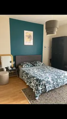 Un ou plusieurs lits dans un hébergement de l'établissement 3-bedroom house with garden, near city center