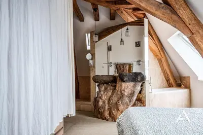 Un ou plusieurs lits dans un hébergement de l'établissement Duplex 55 Grand Duplex en plein centre de Tours