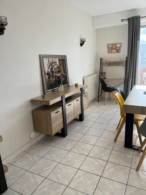 Télévision ou salle de divertissement dans l'établissement Appart Cosy Centre ville -proche gare