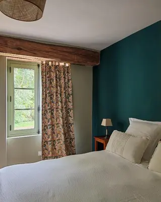 Un ou plusieurs lits dans un hébergement de l'établissement Le Pavillon de Chasse - Castle view - Digital detox