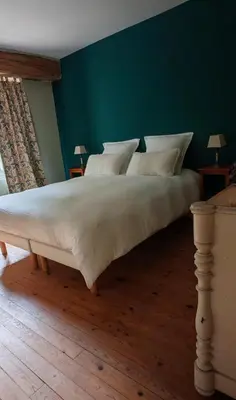 Un ou plusieurs lits dans un hébergement de l'établissement Le Pavillon de Chasse - Castle view - Digital detox