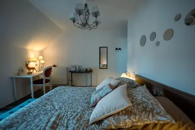 Un ou plusieurs lits dans un hébergement de l'établissement Chouette Nuit