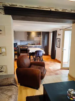 Coin salon dans l'établissement Layon cottage with shared pool