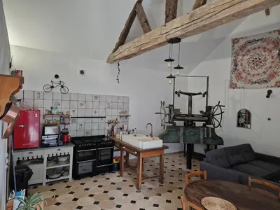 Cuisine ou kitchenette dans l'établissement Maison de vigneron