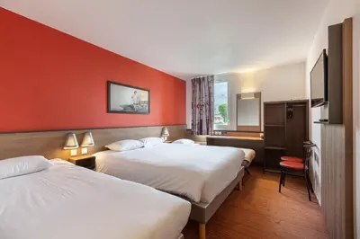 Un ou plusieurs lits dans un hébergement de l'établissement Ace Hôtel Angers