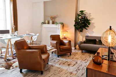 Coin salon dans l'établissement Appartement au pied du Vieux-Mans