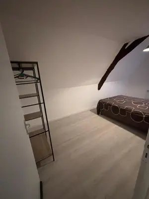 Un ou plusieurs lits dans un hébergement de l'établissement Appartement Numéro 3, centre chateau-renault