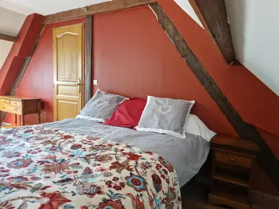 Un ou plusieurs lits dans un hébergement de l'établissement Maison Le Thuau