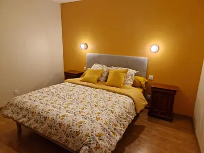Un ou plusieurs lits dans un hébergement de l'établissement Maison Le Thuau