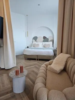 Un ou plusieurs lits dans un hébergement de l'établissement Romantique vertige #Nüit#suite#luxe