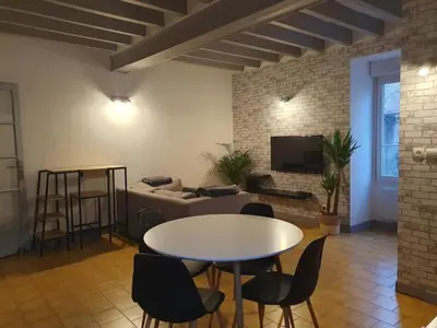 Télévision ou salle de divertissement dans l'établissement Appartement