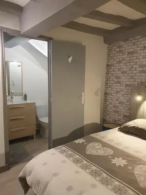 Un ou plusieurs lits dans un hébergement de l'établissement Appartement