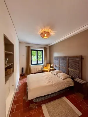 Un ou plusieurs lits dans un hébergement de l'établissement HomeCircus - charming two bedroom house