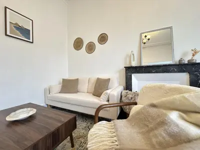 Coin salon dans l'établissement Le Léor - apt 2 chambres en cœur de ville