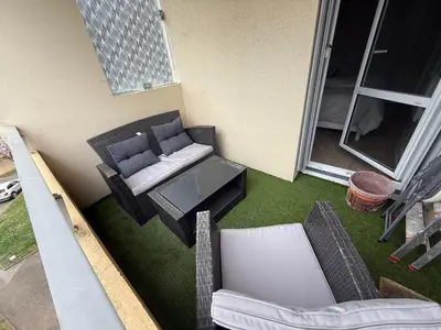 Coin salon dans l'établissement Appartement 24h - Le Mans
