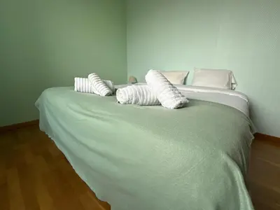 Un ou plusieurs lits dans un hébergement de l'établissement Bois Sangha Maison 3 chambre avec jardin clos