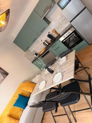 Coin salon dans l'établissement Appartement cosy au cœur du Mans Proche Centre-Ville