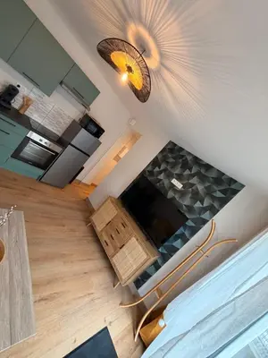 Cuisine ou kitchenette dans l'établissement Appartement cosy au cœur du Mans Proche Centre-Ville