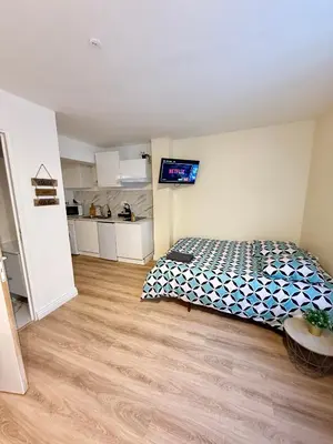 Un ou plusieurs lits dans un hébergement de l'établissement Studio Coconia RDC - Proche Centre & Gare - WiFi