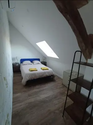 Un ou plusieurs lits dans un hébergement de l'établissement Gîte MA POULE de 1 à 5 personnes avec piscine