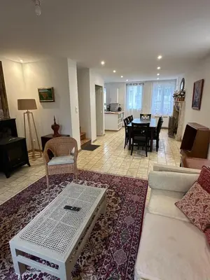 Coin salon dans l'établissement Le Cottage