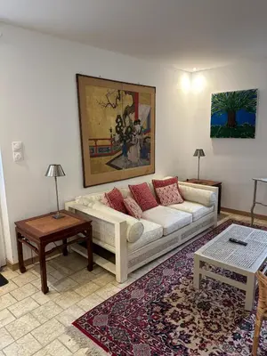 Coin salon dans l'établissement Le Cottage