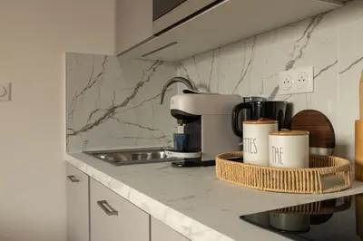 Cuisine ou kitchenette dans l'établissement 301 Chanzy - T1 Bord de Mer - Lumineux & Cosy - 3P