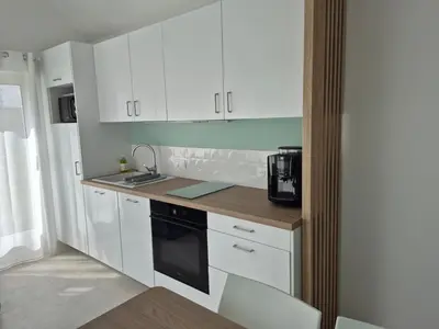 Cuisine ou kitchenette dans l'établissement Le cocoon idyllique