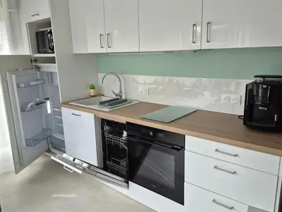 Cuisine ou kitchenette dans l'établissement Le cocoon idyllique