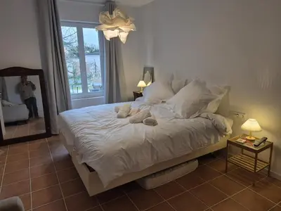 Un ou plusieurs lits dans un hébergement de l'établissement Maison de la Croix Verte - Gite 13 personnes a Chambourg