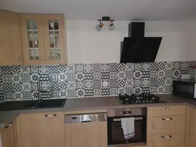 Cuisine ou kitchenette dans l'établissement Le Gîte du Noyer