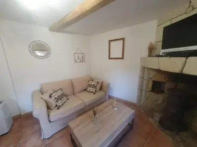 Télévision ou salle de divertissement dans l'établissement Le Gîte du Noyer