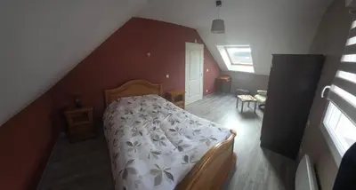 Un ou plusieurs lits dans un hébergement de l'établissement Chambre proche circuit 24h du mans