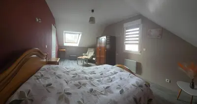 Un ou plusieurs lits dans un hébergement de l'établissement Chambre proche circuit 24h du mans