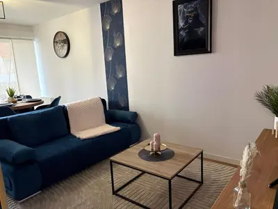 Coin salon dans l'établissement Douce parenthèse - T2 à 10 min du circuit 24h