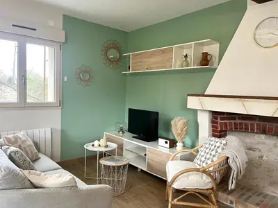 Télévision ou salle de divertissement dans l'établissement La Maison Agoméa