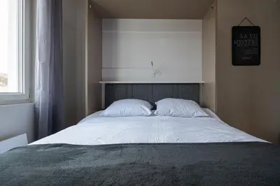 Un ou plusieurs lits dans un hébergement de l'établissement 307 Chanzy - Industriel - Studio Design - Centre