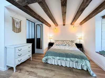 Un ou plusieurs lits dans un hébergement de l'établissement La Maisonnette de Carreaux