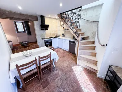 Cuisine ou kitchenette dans l'établissement La Maisonnette de Carreaux