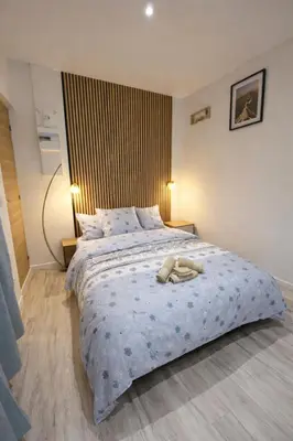 Un ou plusieurs lits dans un hébergement de l'établissement Tiny House Marie