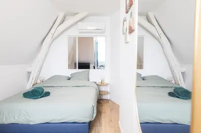 Un ou plusieurs lits dans un hébergement de l'établissement Le Clos Hérault Châtellerault Centre-Gare