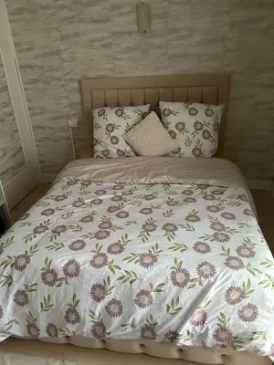 Un ou plusieurs lits dans un hébergement de l'établissement Appartement lumineux,3 chambres,proche de la gare